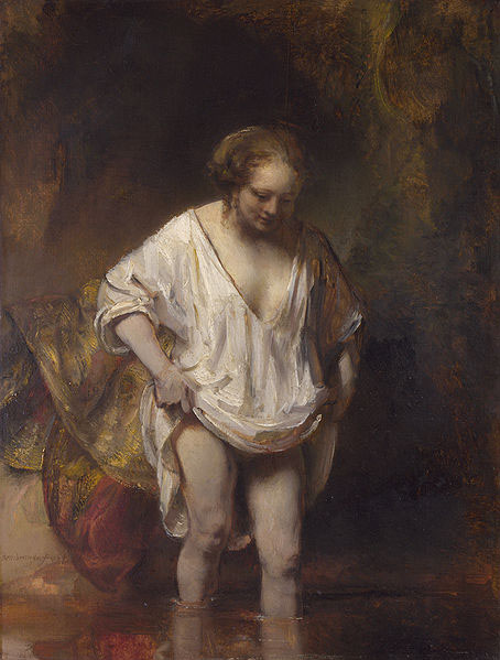 A woman bathing.